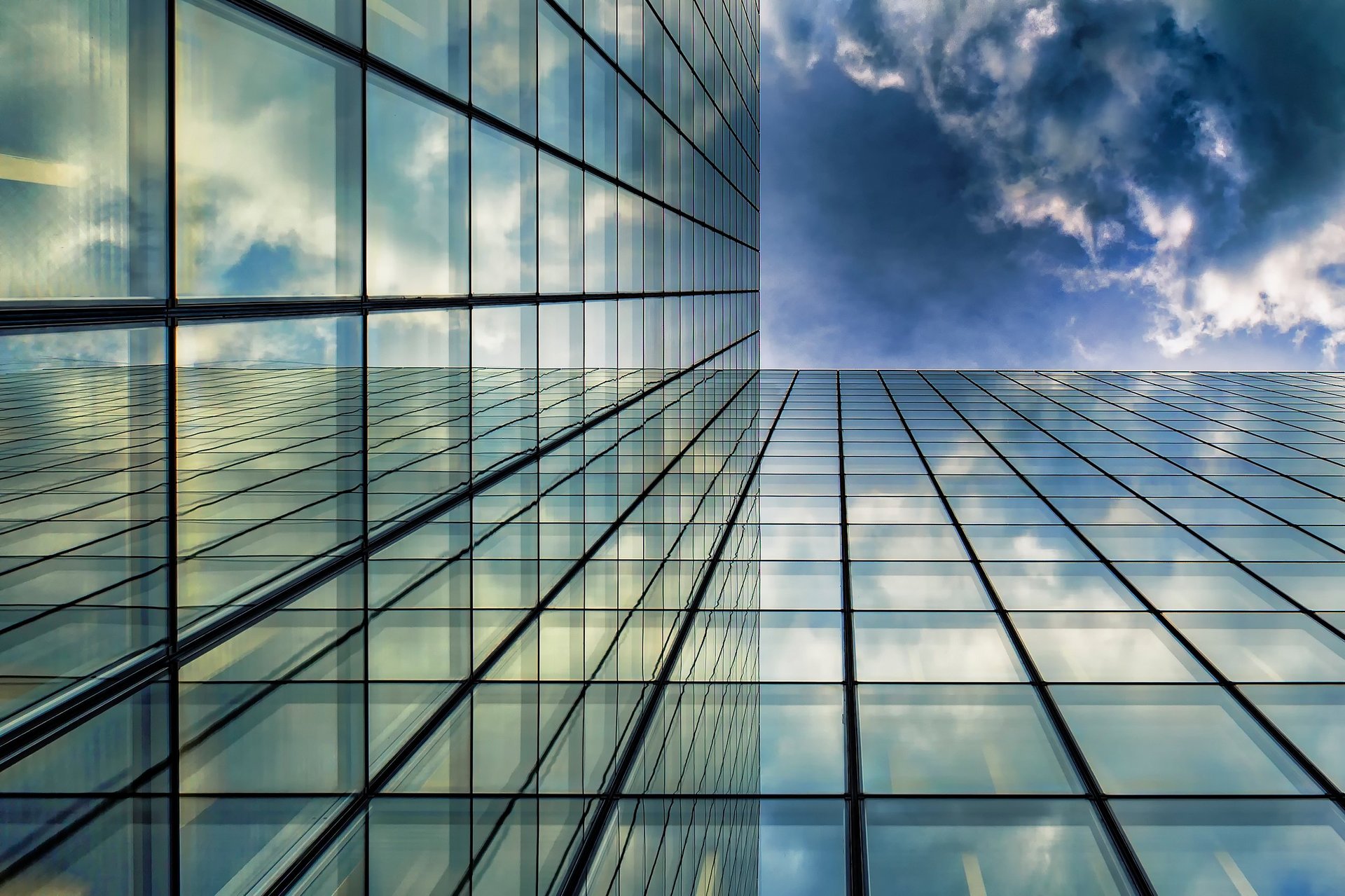 Corporate buildings and skyscrapers with views from below and reflections